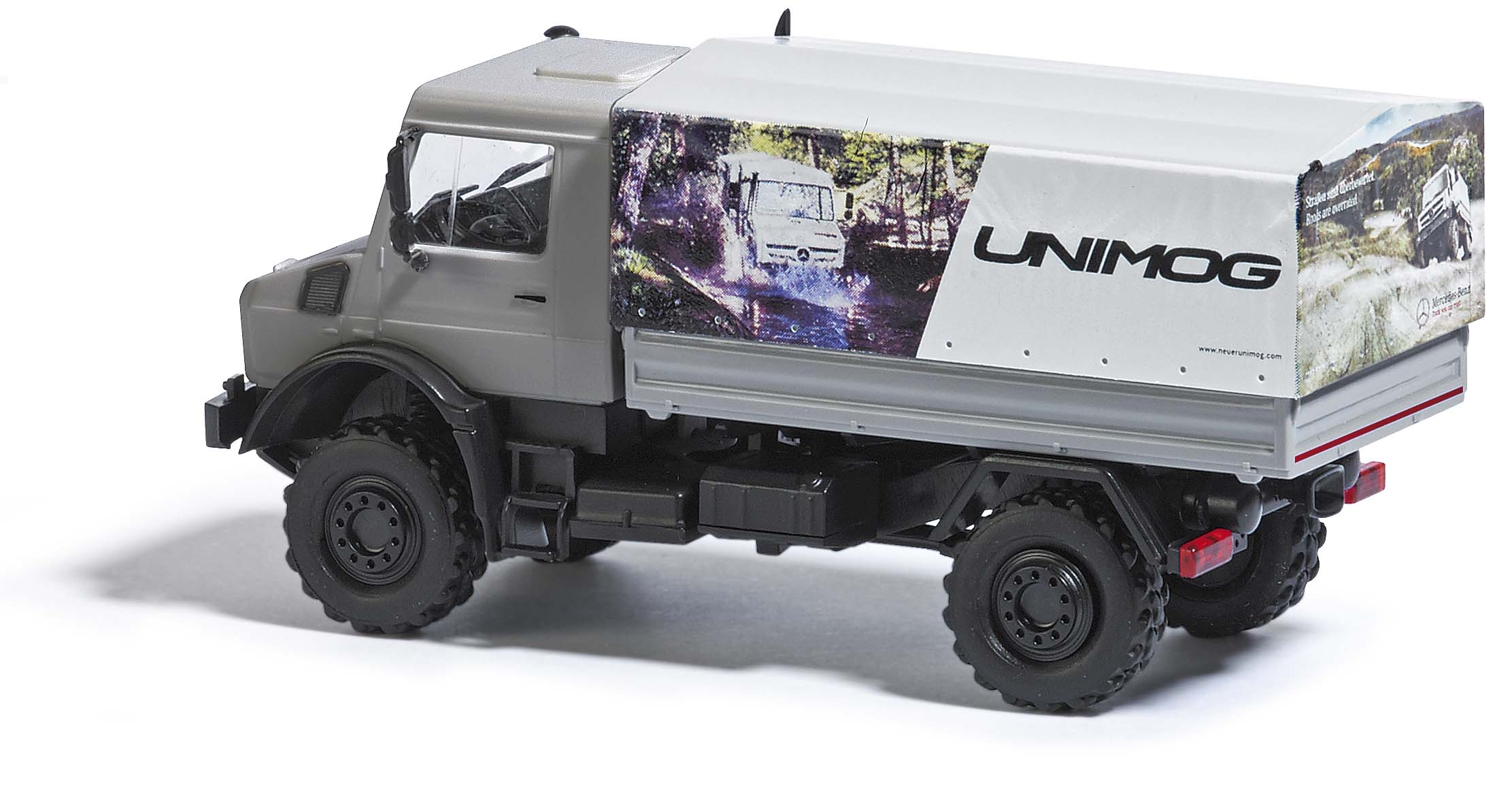 BUSCH 51015 Unimog U5023 Pritsche/Plane - vasutmodell.com